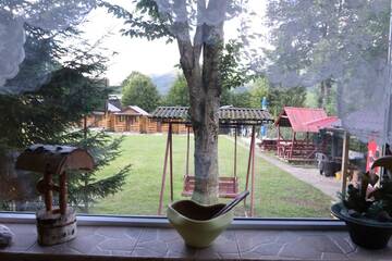 Фото номера Вилла с 1 спальней Виллы Tarcau Poiana Soarelui - Cabanute - Camping г. Tarcău 18