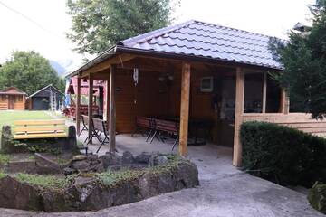 Фото номера Вилла с 1 спальней Виллы Tarcau Poiana Soarelui - Cabanute - Camping г. Tarcău 7